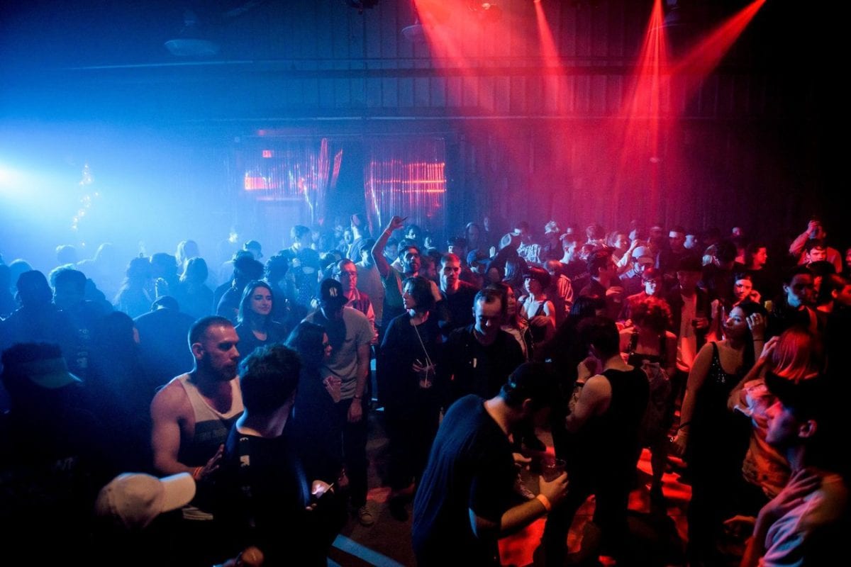 Attendees enjoy the music at Technopolis, part of the Red Bull Music Academy Festival, at The 1896 Studio Stages in Brooklyn, NY, USA on 14 May, 2016.